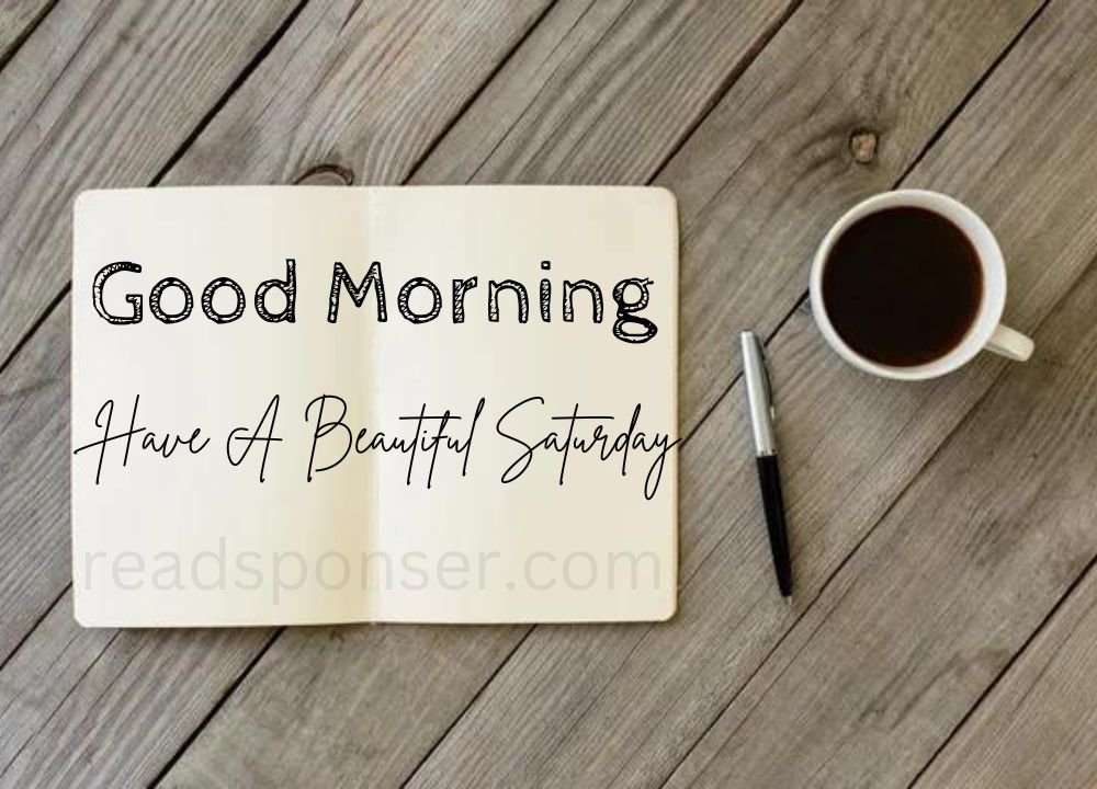 A Cup, pen and a book is putting on the bench and have a message of good morning in this satuday morning